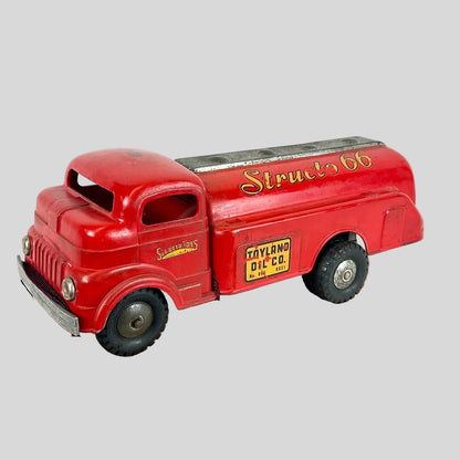 Red vintage-style truck model on a white background