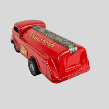 Red vintage-style truck model on a white background