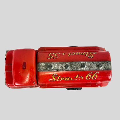 Red toy car with 'Structo 66' branding on a white background