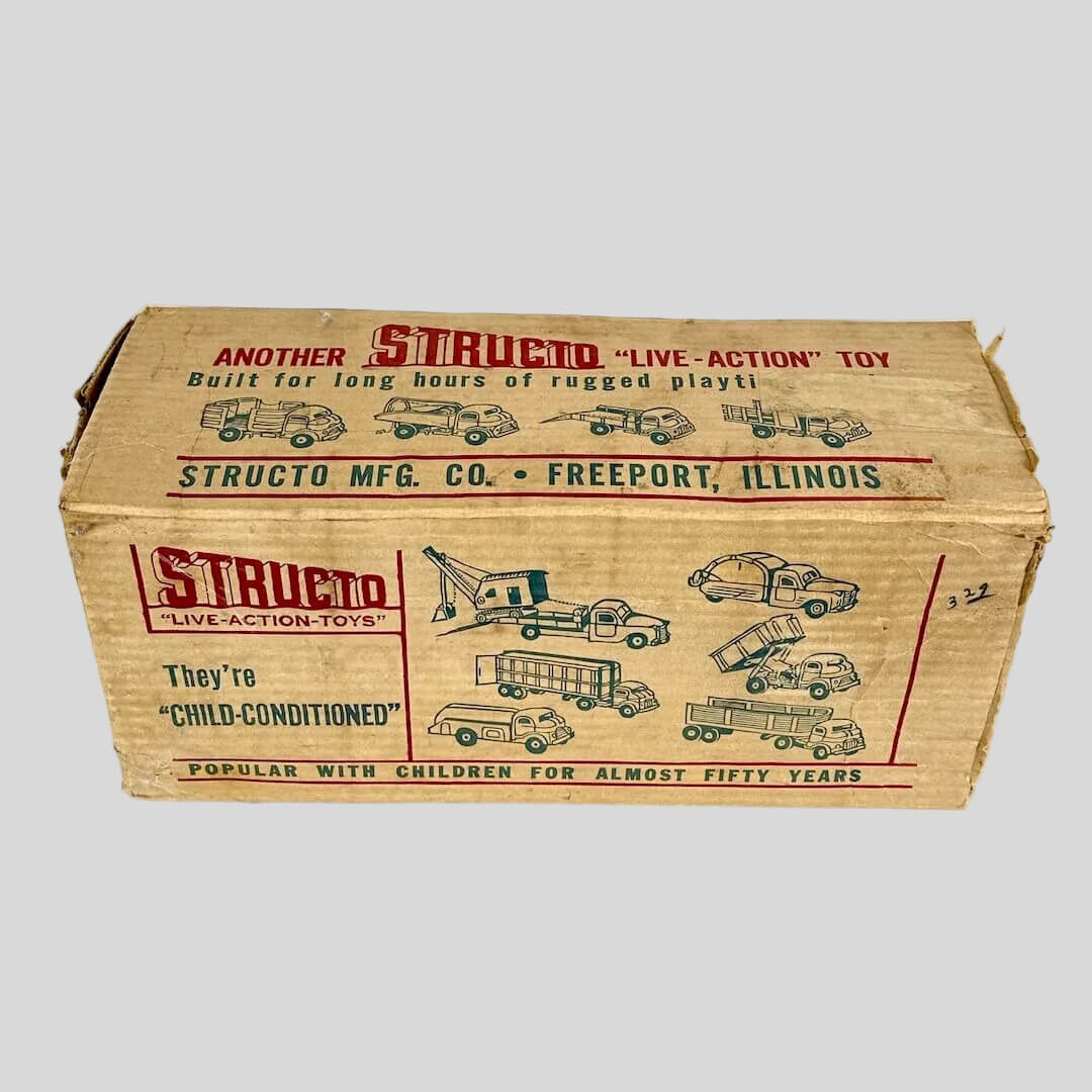 Vintage Structo toy box with toy illustrations on a white background