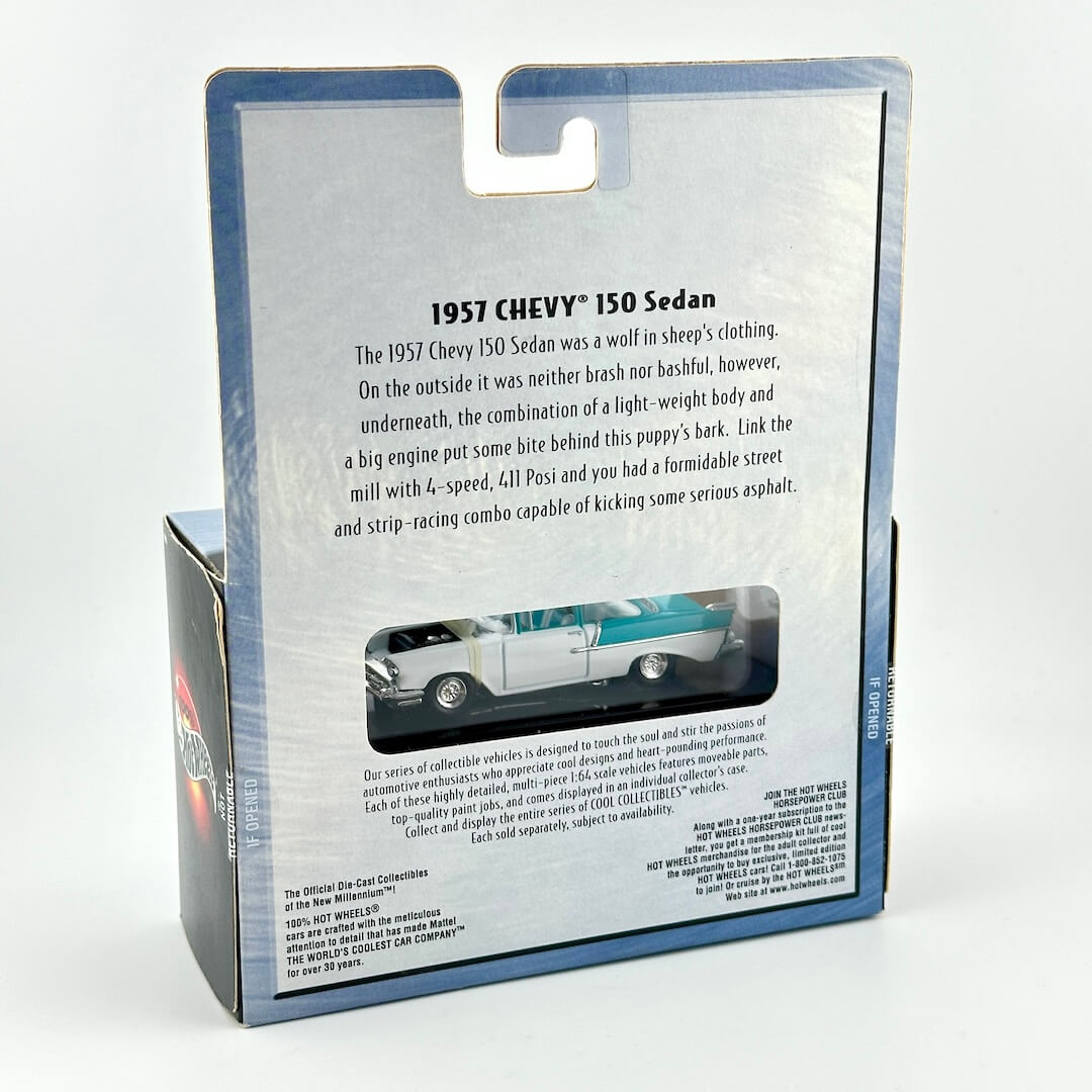 Back of a 1957 Chevy 150 Sedan model car packaging box, showing printed text and a window to show the car.