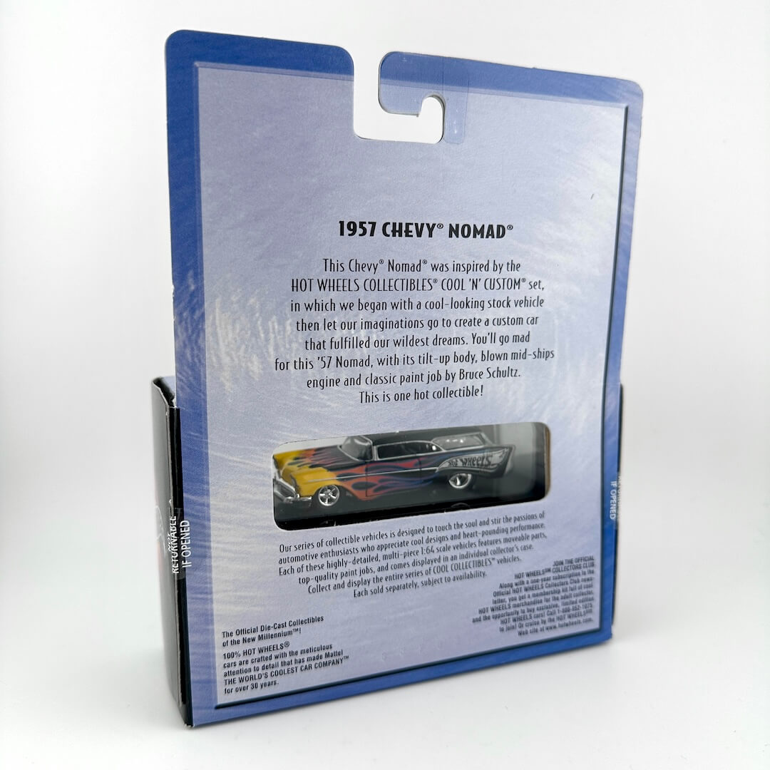 Back of a 1957 Chevy Nomad collectible car packaging, showing product info text & a small window displaying the car.