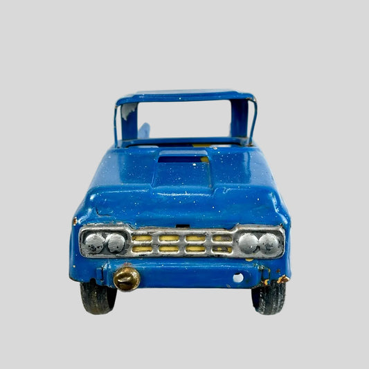 Vintage blue toy truck on a white background