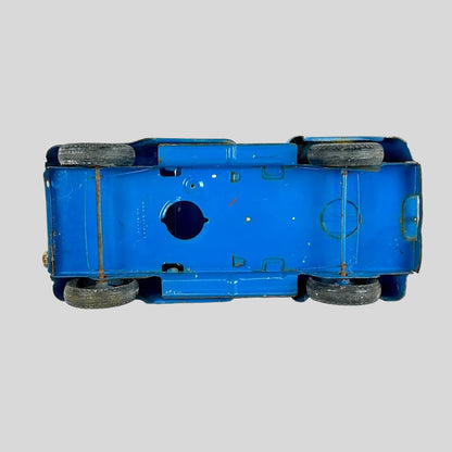Blue toy car on a white background
