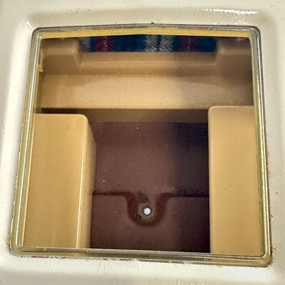 Interior of camper as seen from opening on top. 