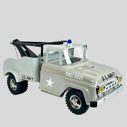 Model of a U.S. Navy tow truck on a white background