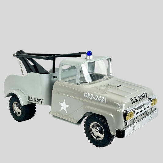 Model of a U.S. Navy tow truck on a white background