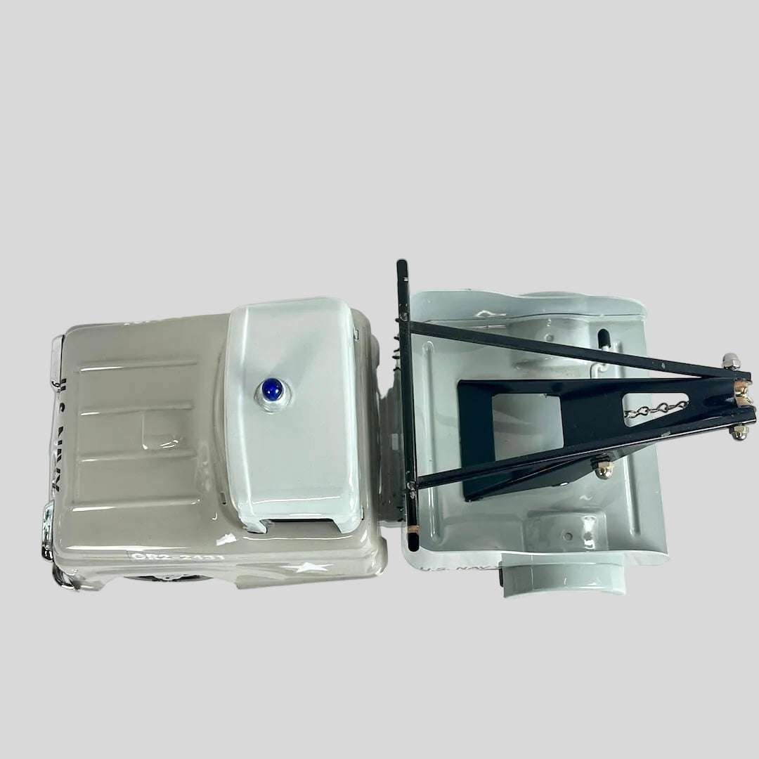 Top view of Tonka chariot style tow truck. No chips in paint. Gray background. 