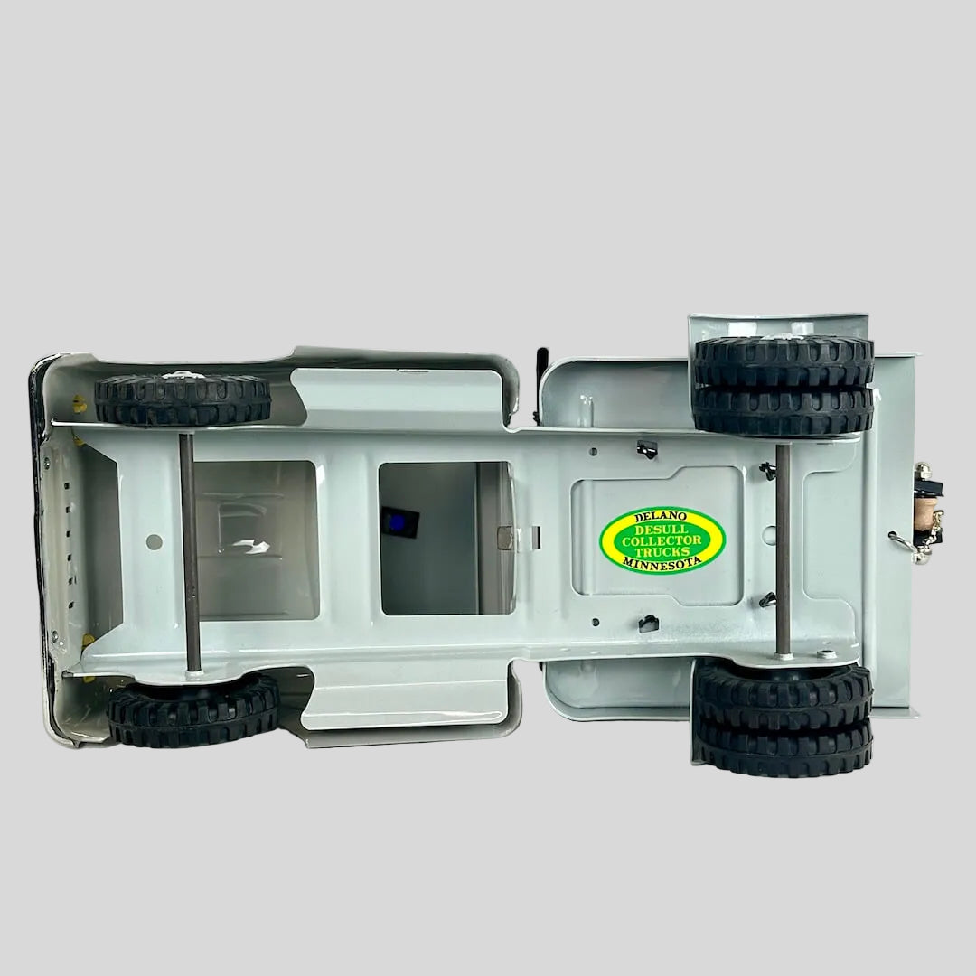 Model truck chassis with wheels on a white background