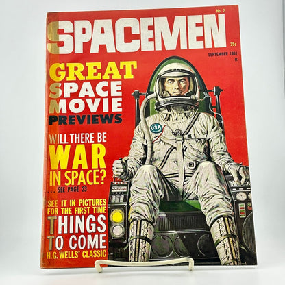 Vintage magazine cover featuring an astronaut with text about space movies and war in space.