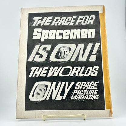 Vintage magazine cover with text 'The Race for Spacemen is On! The World's Only Space Picture Magazine' on a light gray background.