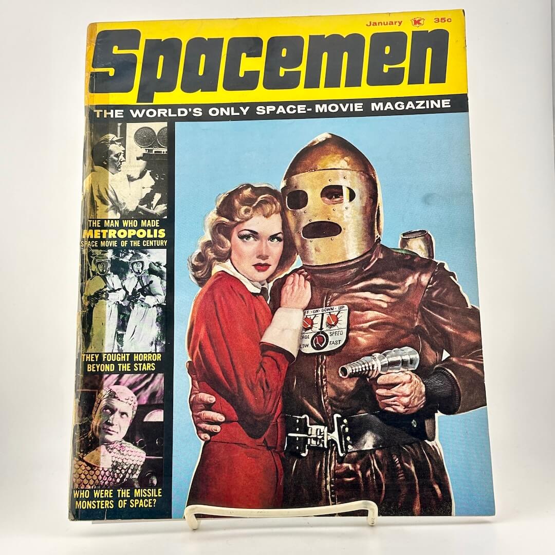 Vintage magazine cover titled 'Spacemen' featuring a woman and a character in a spacesuit.