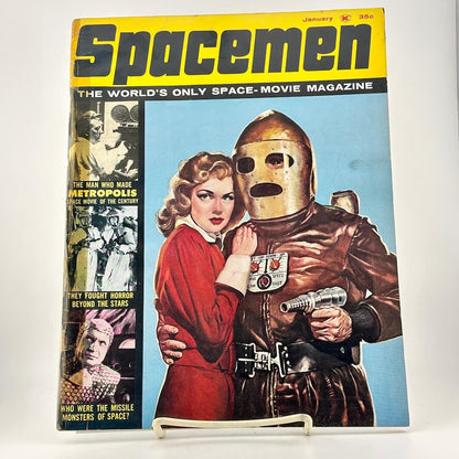 Vintage magazine cover titled 'Spacemen' featuring a woman and a character in a spacesuit.