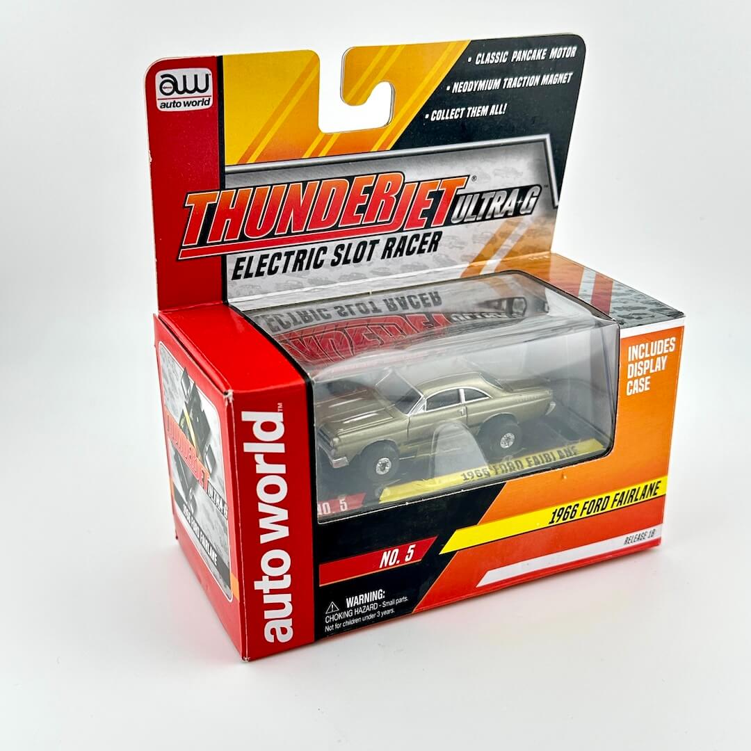 Boxed Thunderjet Ultra-G electric slot racer with Autoworld branding on a white background