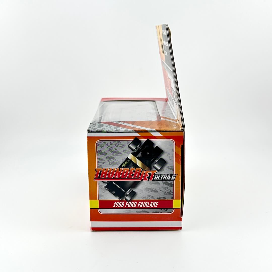 Boxed model car of a 1966 Ford Fairlane with 'Thunderjet Ultra-G' branding on a white background.