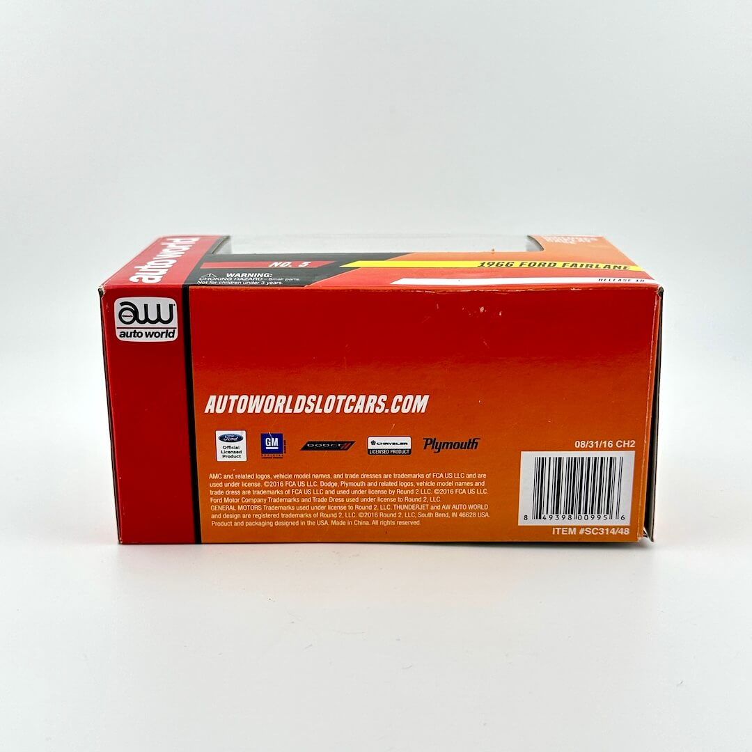 Red box with 'Autoworld Slot Cars' branding on a white background