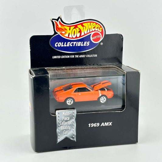 Hot Wheels Collectibles 1969 AMX diecast toy car in its original packaging, featuring an orange car with black racing stripes.