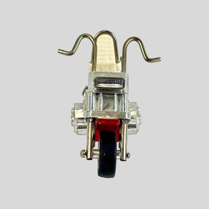 Small model motorcycle on a white background