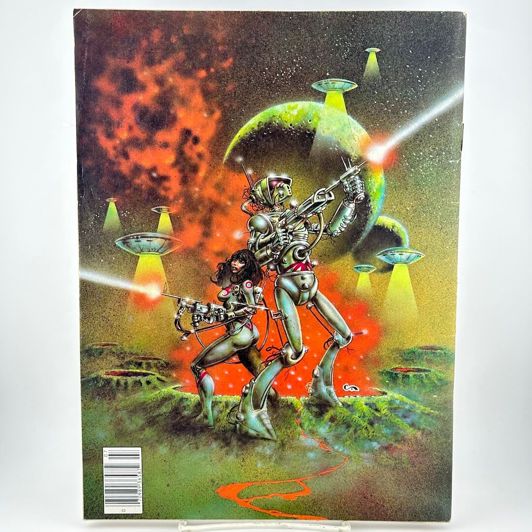 Back of magazine cover with woman and robot fighting side by side with UFOs in background. 
