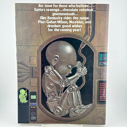 Back cover of magazine with cyborg child in womb and list of highlighted contents. 