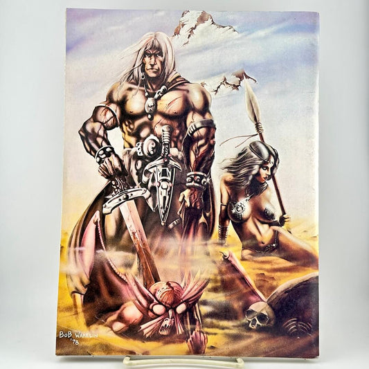 Back cover of magazine showing dystopian style couple on sandy landscape. 