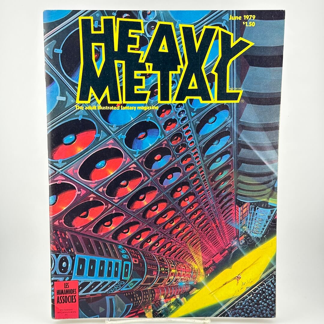 "Heavy Metal" magazine cover with illustrated wall of speakers and panels.