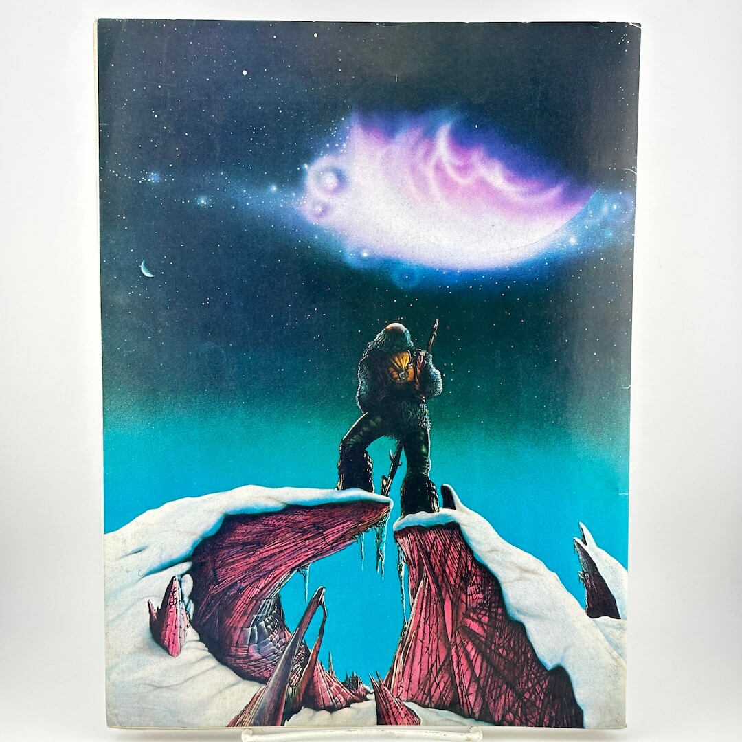 Back cover of magazine with man standing in snow landscape looking up at aurora in the sky