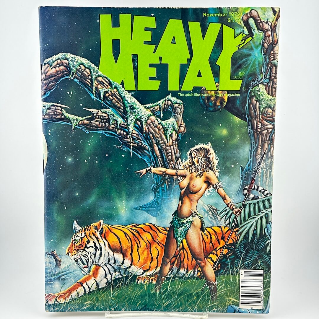 "Heavy Metal" magazine cover with illustration of woman pointing and tiger crouching. 