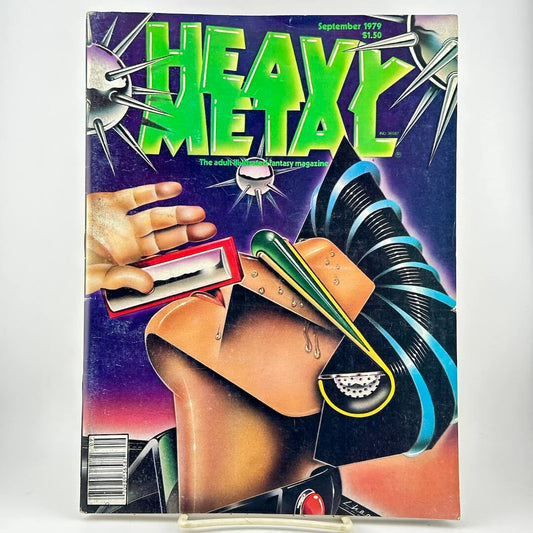 Heavy Metal magazine with a bold cover illustration with the title in large green letters and a futuristic sci-fi design on a purple background.