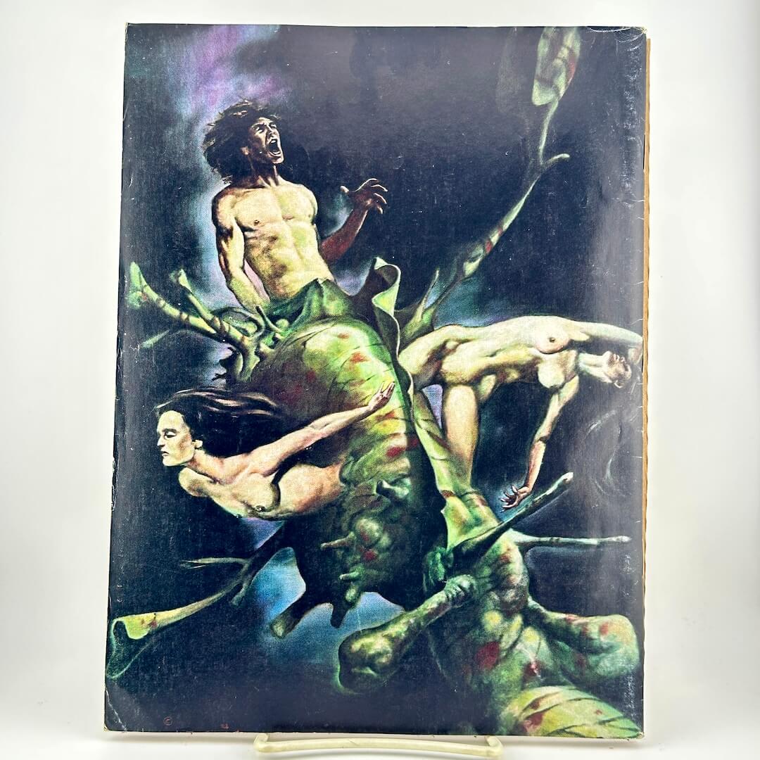 Back cover featuring surreal, dark fantasy-style figures in green and flesh tones against a black background.
