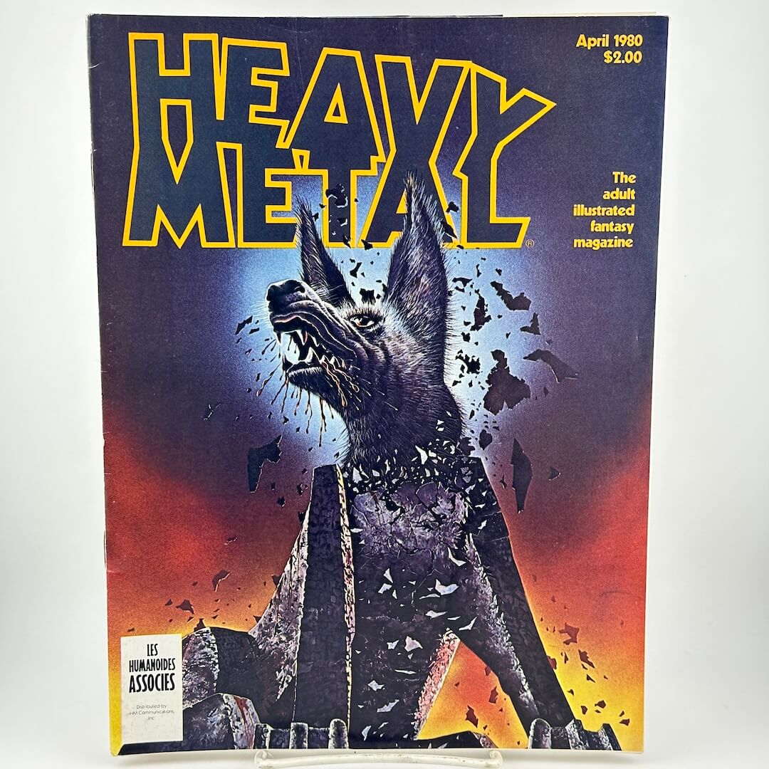"Heavy Metal" magazine cover with illustration of angry dog in center. 