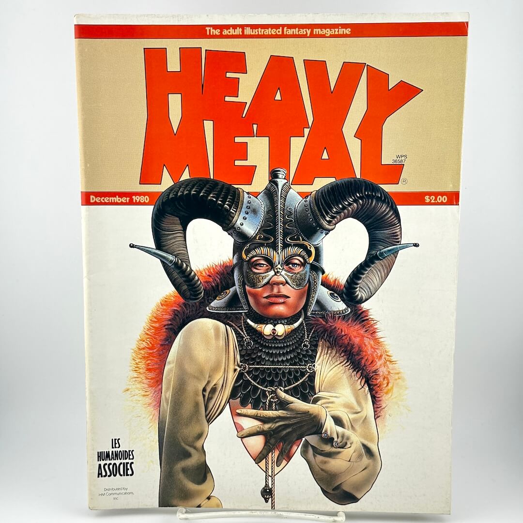 "Heavy Metal" magazine cover with woman wearing headdress with horns. 