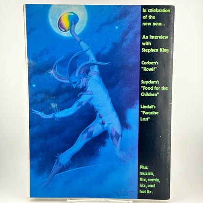 Back cover of magazine with jester figure holding orb aloft, with text along right side of featured contents. 