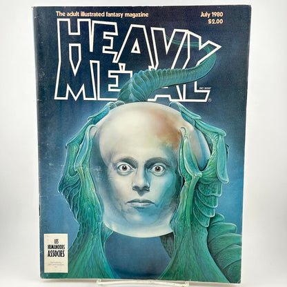"Heavy Metal" magazine cover cover alien hands holding orb with head inside. 
