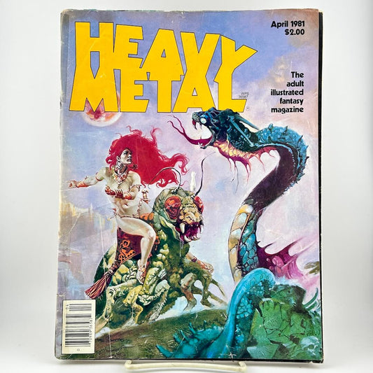 Heavy Metal magazine with fantasy artwork of a woman riding a green creature with a blue serpent-like monster in the back
