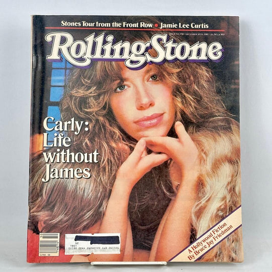 A vintage issue of Rolling Stone magazine cover featuring a close-up portrait of Carly Simon. 