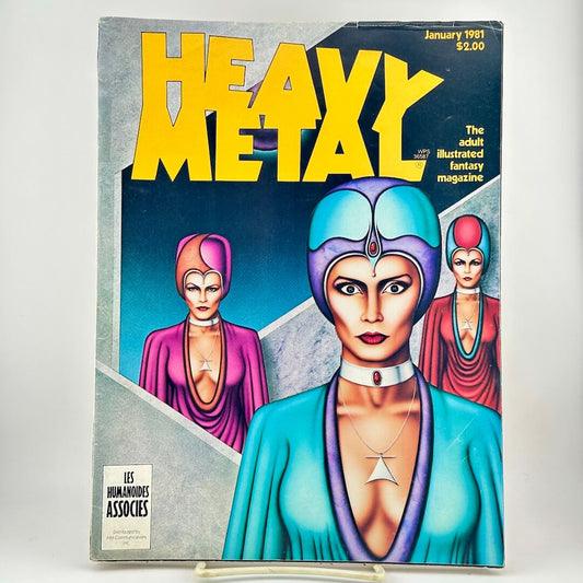 Heavy Metal magazine with retro-futuristic sci-fi cover art with three stylized female figures in colorful robes.