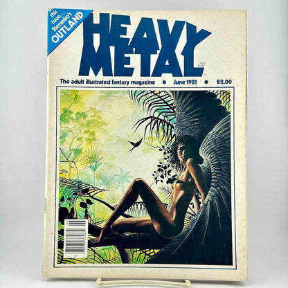 Heavy Metal magazine featuring the iconic blue title logo and cover art of a winged fantasy figure in a jungle setting.