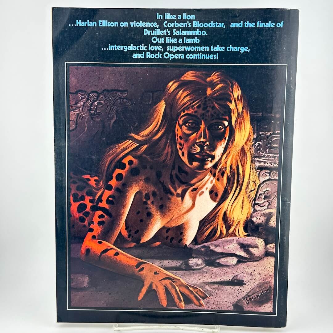 Back cover of magazine with list of highlighted content above illustration of cheetah-woman hybrid. 