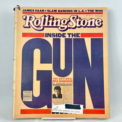 A vintage issue of Rolling Stone magazine, titled 'Inside the Gun', featuring a beige cover with large blue and red typography.
