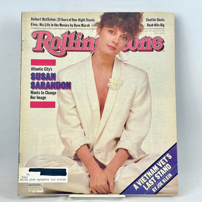 Vintage Rolling Stone magazine with cover featuring Susan Sarandon sitting cross-legged wearing white. 