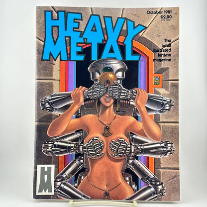 Heavy Metal magazine featuring cover art of a nude woman with robotic arms and a metal visor over her eyes.