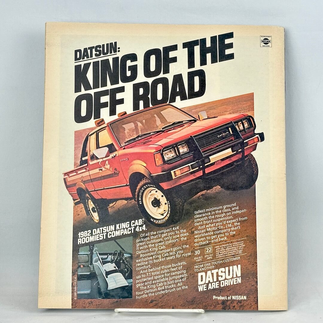 A vintage Datsun ad on back cover of magazine.