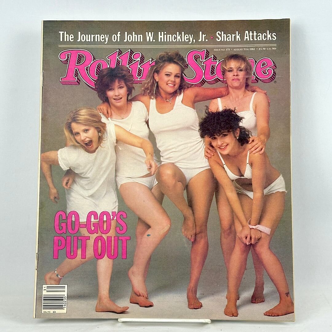 A vintage issue of Rolling Stone magazine featuring five women in white lingerie on the cover.