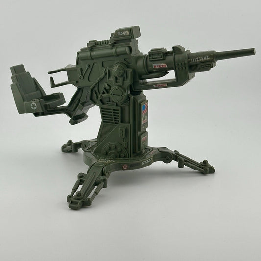 Army green anti aircraft cannon style gun with seat. Features G.I. Joe and American flag stickers. 