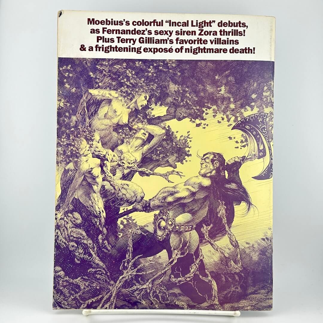 Back cover of magazine with illustration of man chopping down anthropomorphized tree. 