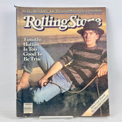 A vintage Rolling Stone magazine cover featuring a photo of Timothy Hutton wearing a hat and striped shirt. 