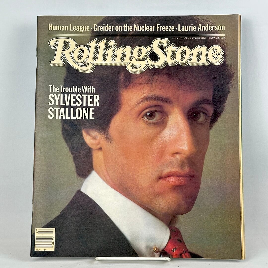 A vintage issue of Rolling Stone magazine featuring Sylvester Stallone on the cover.