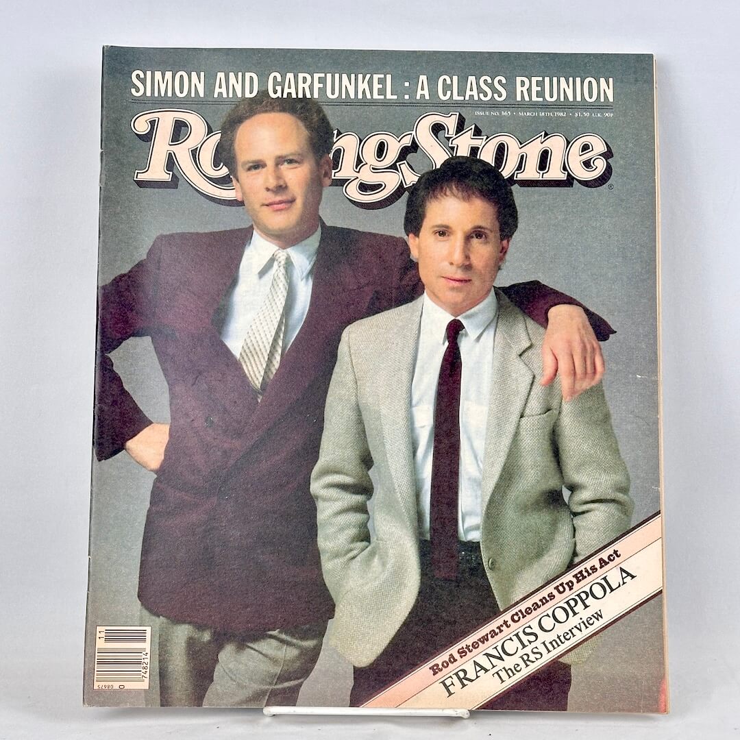 A vintage Rolling Stone magazine cover featuring Simon and Garfunkel on the front.