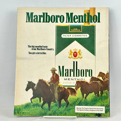 A vintage Marlboro Menthol filter cigarette pack advertisement on back cover of magazine. 